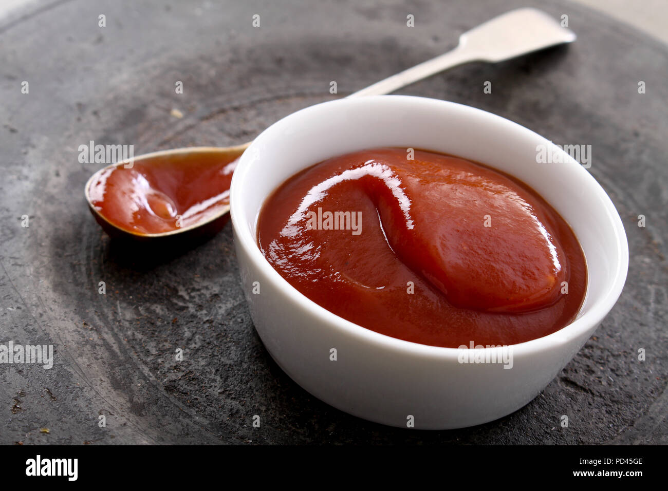 fresh tomato ketchup in dish Stock Photo Alamy