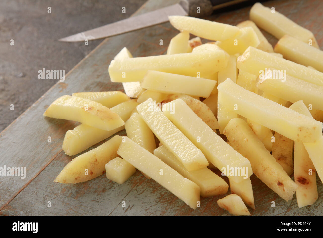 uncooked chipped potatoes Stock Photo Alamy
