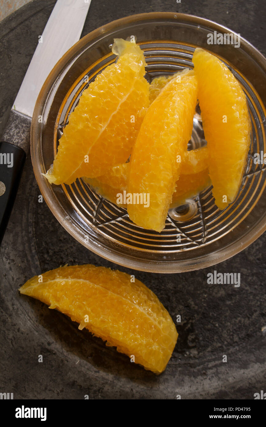 preparing fresh oranges Stock Photo