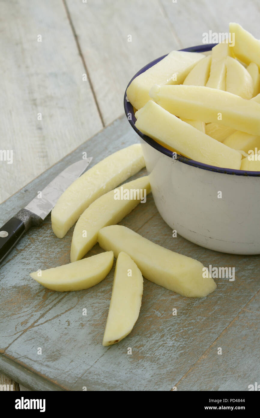 Chipping potatoes hires stock photography and images Alamy
