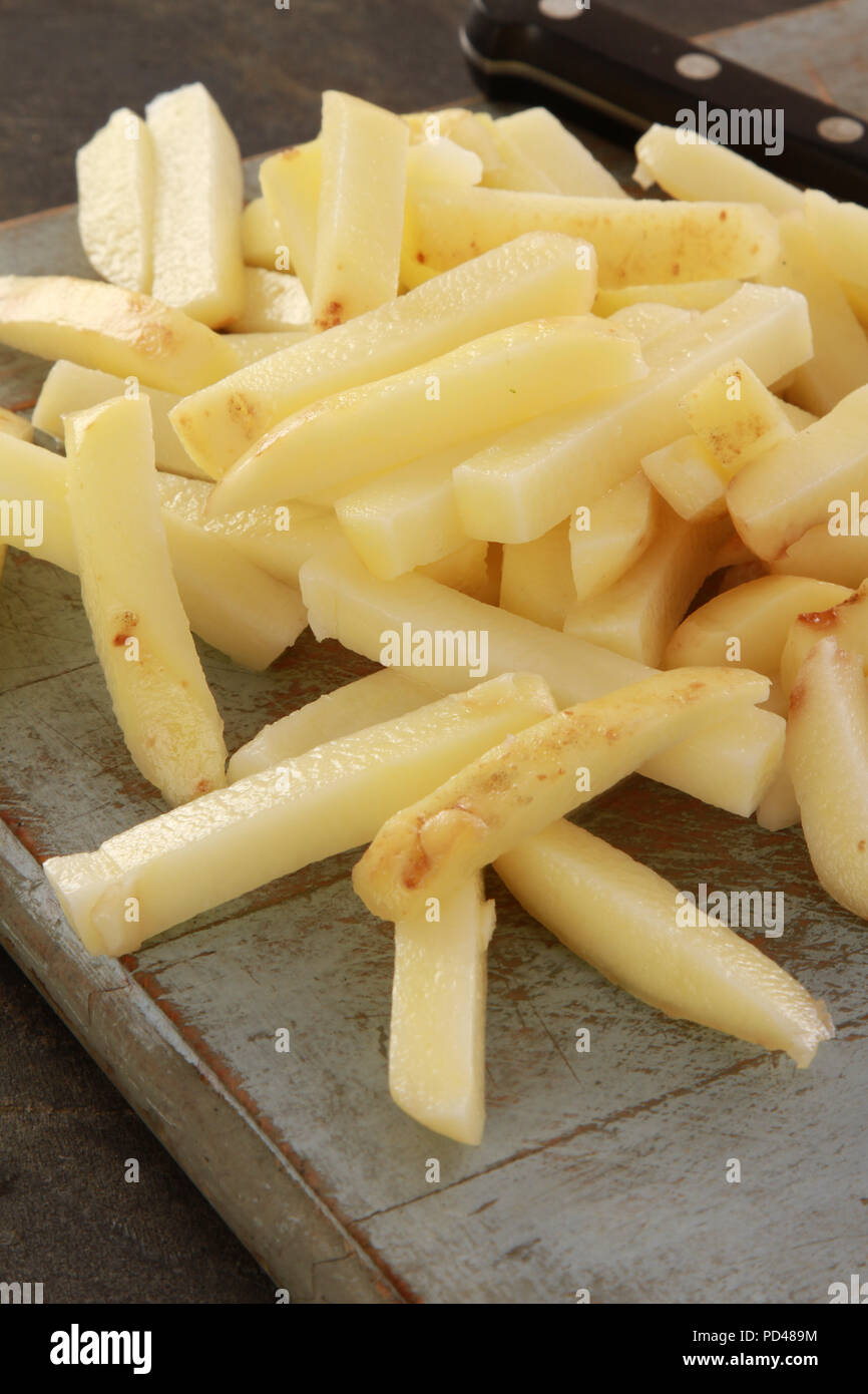 uncooked chipped potatoes Stock Photo Alamy