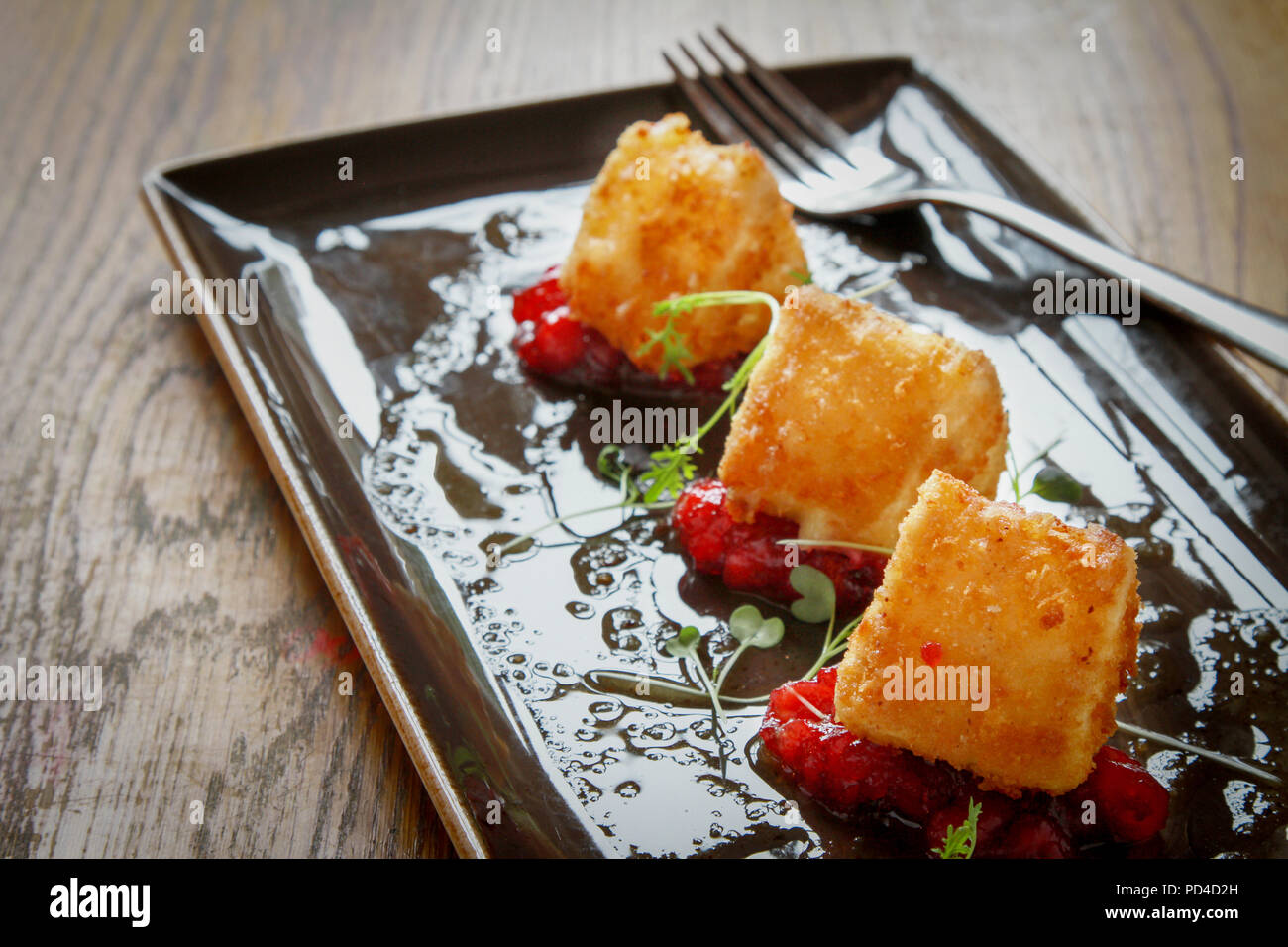 fried brie cheese appetizer Stock Photo Alamy