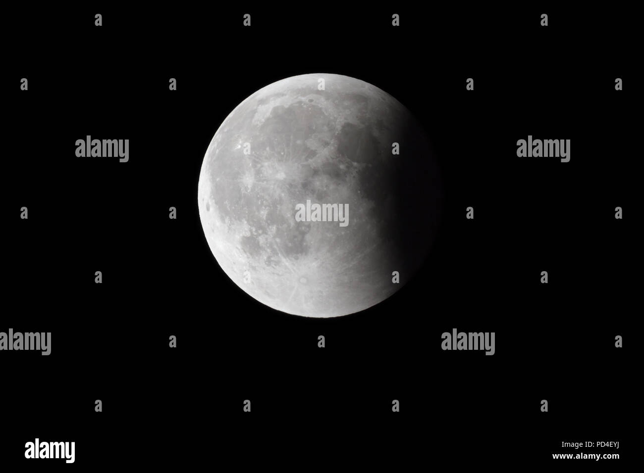 Super Bloody Moon Full Eclipse Last Phase Against Black Sky Background Quarter Of The Moon Surface Covered By Earth S Shadow Stock Photo Alamy
