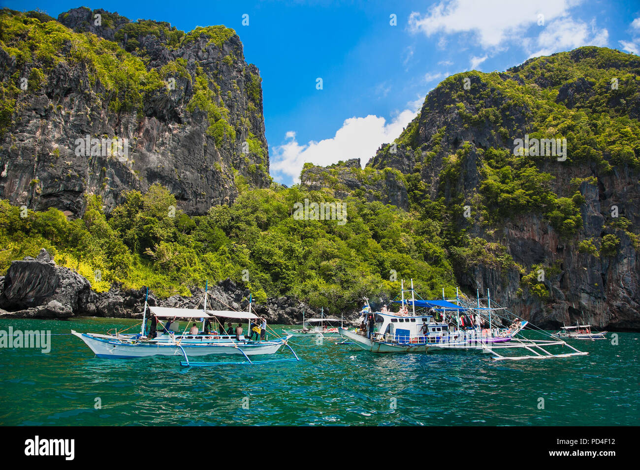 Scenic landscape with mountain islands and blue lagoon El Nido at Palawan. Philippines. Southeast Asia. Exotic scenery. Popular landmark famous destin Stock Photo