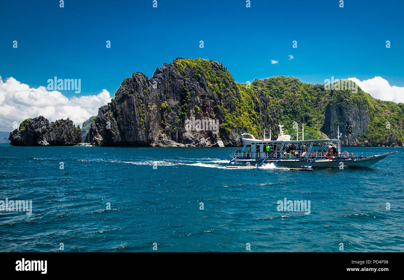 Scenic landscape with mountain islands and blue lagoon El Nido at Palawan. Philippines. Southeast Asia. Exotic scenery. Popular landmark famous destin Stock Photo