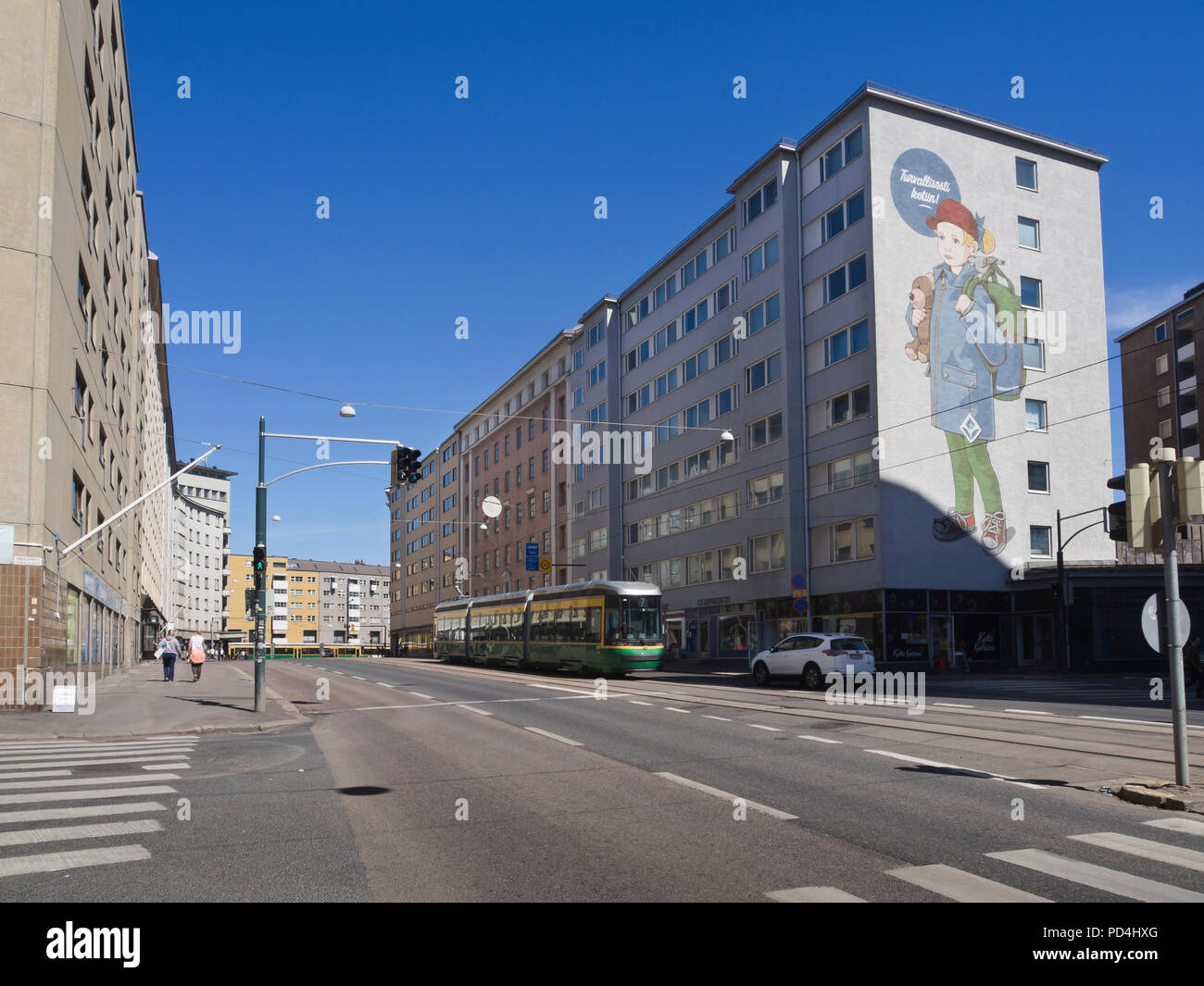 Hämeentie street in the inner city of Helsinki Finland, apartment blocks tram line sidseveral lanes for traffic Stock Photo