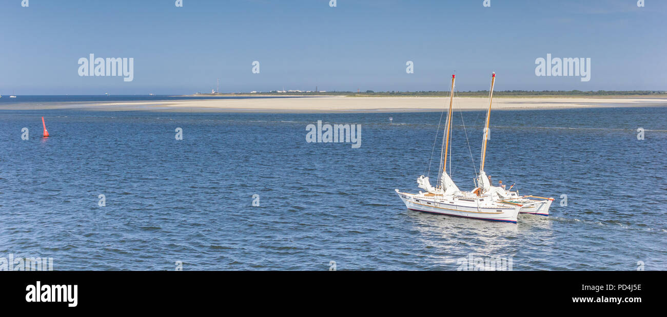 Panorama of a catamaran near the island of Borkum, Germany Stock Photo