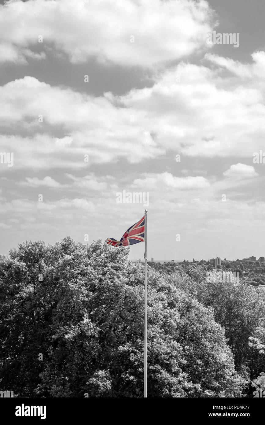 union jack flag flying from a pole in london in black and white Stock