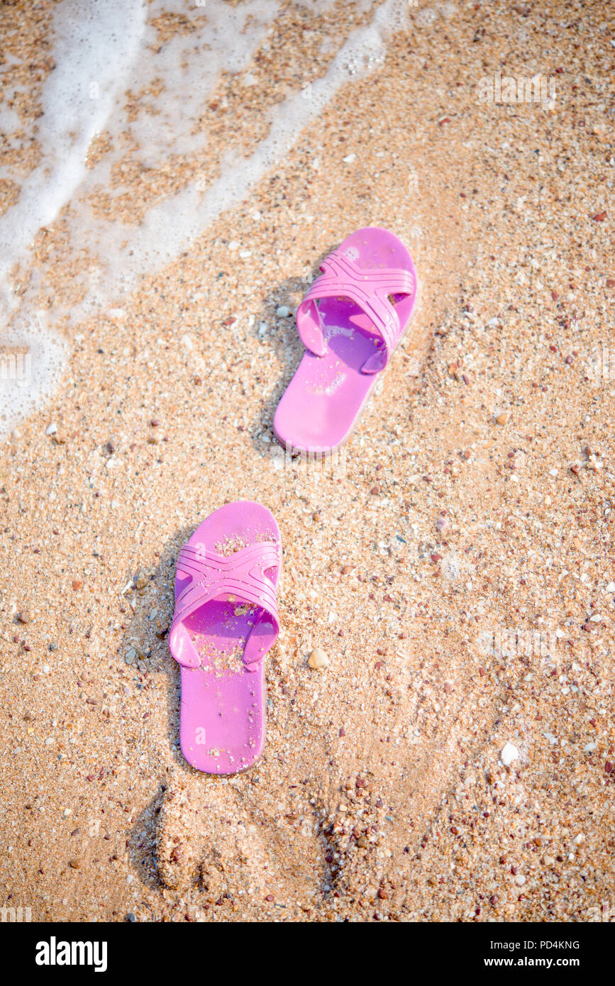 shoes on beach Stock Photo Alamy