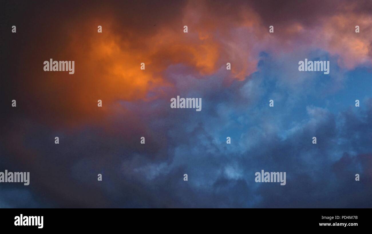 The sunlight on the skies, just before the sun sets. Stock Photo