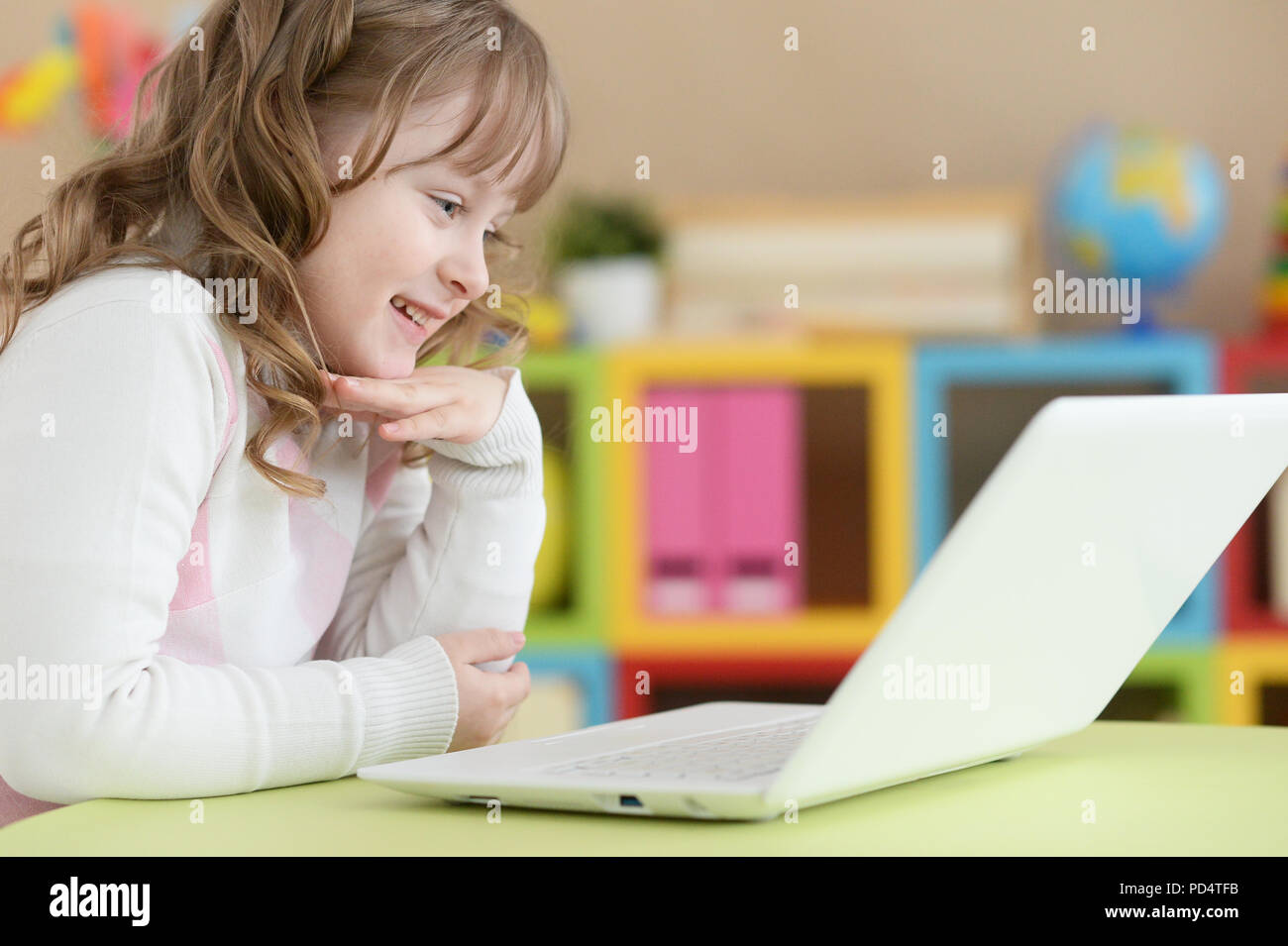 cute girl using laptop Stock Photo Alamy