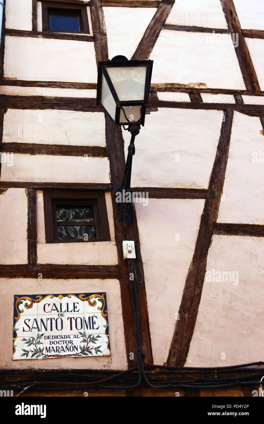 Historic half-timbered building and Calle de Santa Tome street sign, Toledo, Castile-La Mancha, Spain Stock Photo