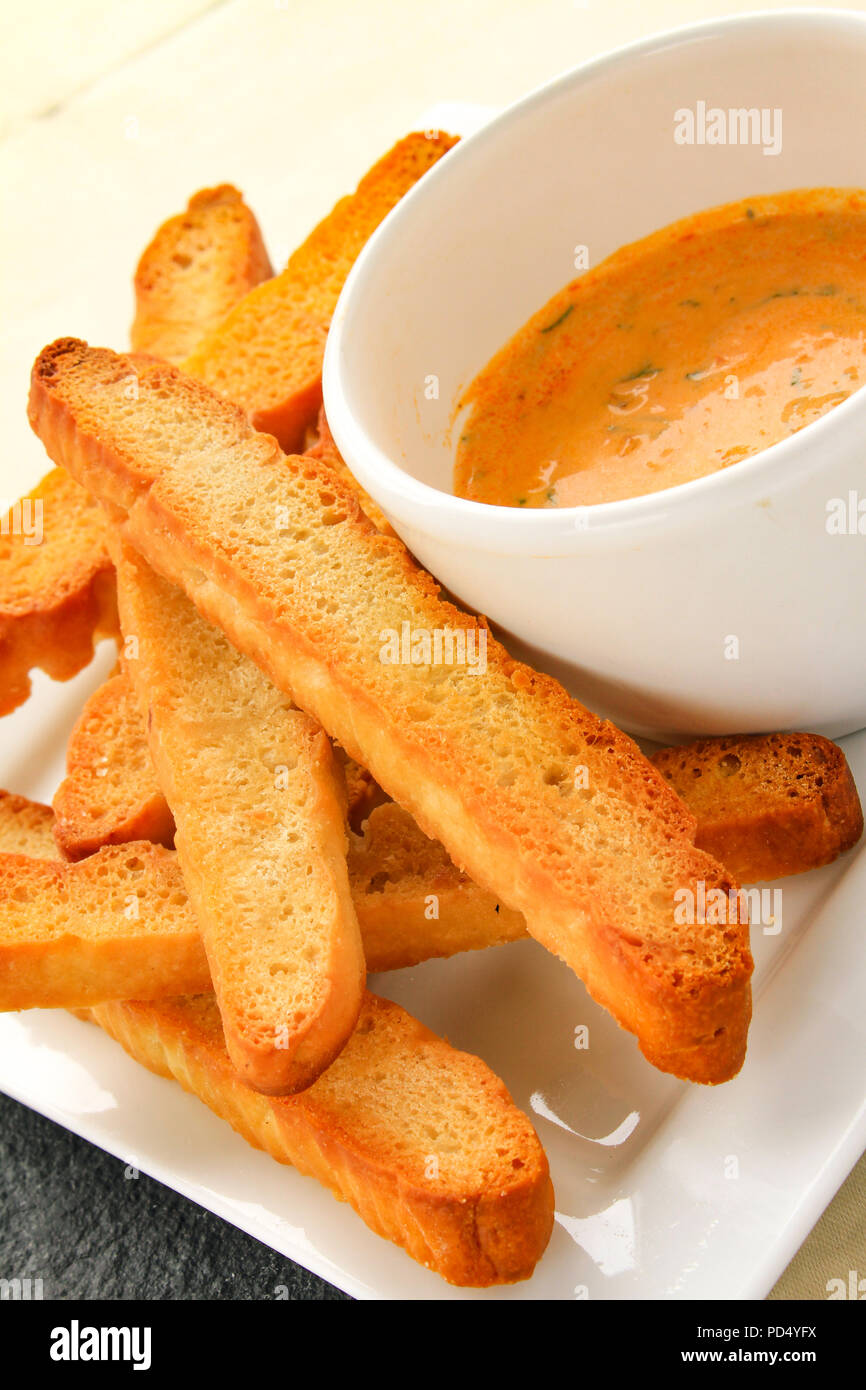 sun dried tomato dip with toasted bread Stock Photo Alamy