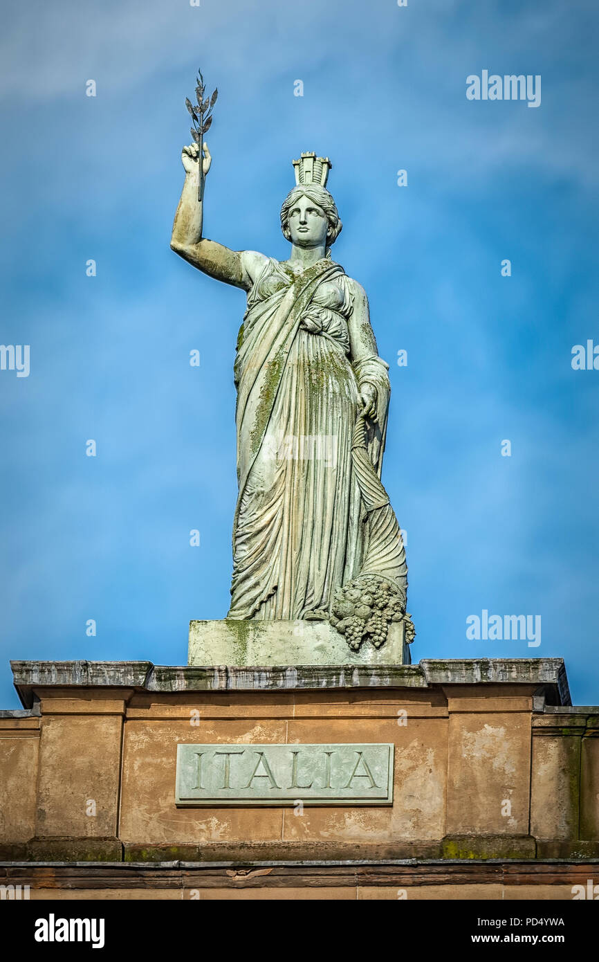 The Italia statue by Alexander Stoddart on top of the Italian Centre in the Merchant City area of Glasgow, Scotland. Stock Photo