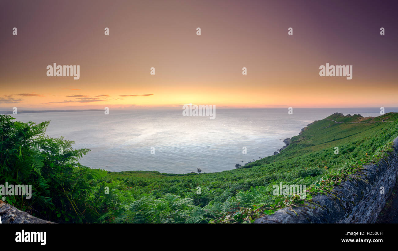 Summer sunrise on a clear day on the Start Point peninsula and light