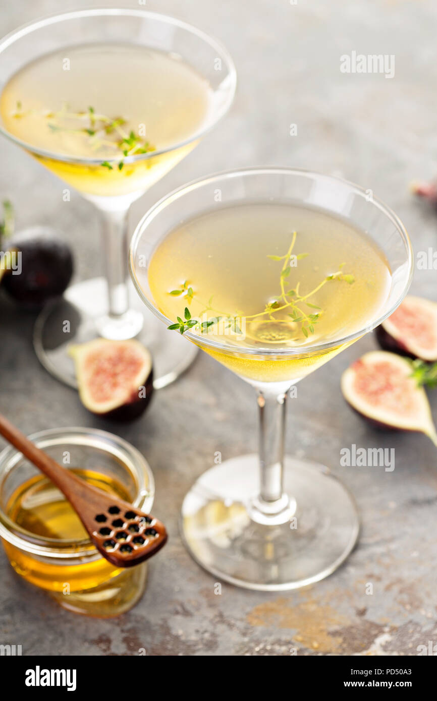 Fall cocktail, fig and honey martini with thyme Stock Photo Alamy