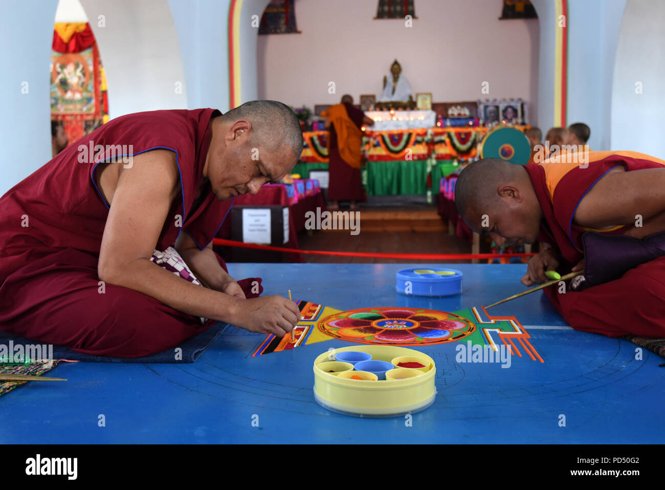 Tibetan monks create mandala in the Khosheutovsky temple (khurul)  - the oldest Kalmyk’s buddhistic temple in Europe, Astrakhan region, Russia Stock Photo