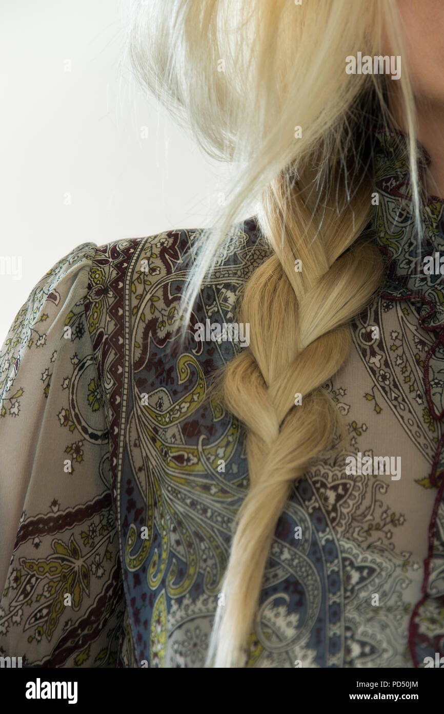 Concept Of Stylish Hairstyle Close Up Of A Blond Woman With