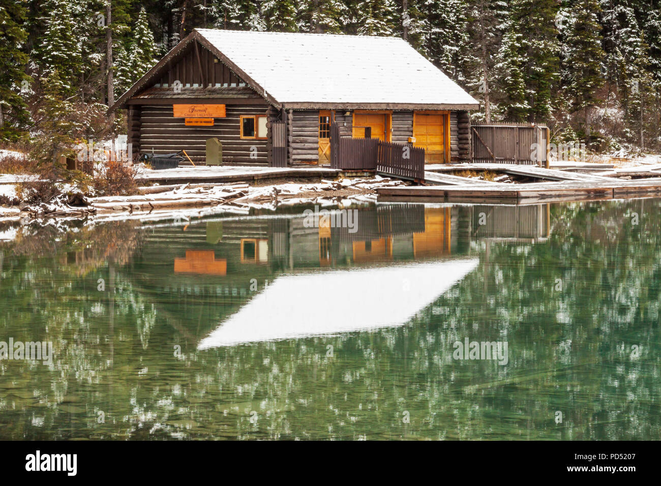 Snow And Snow Reflection On Roof Of Cabin On Lake Louise In Banff