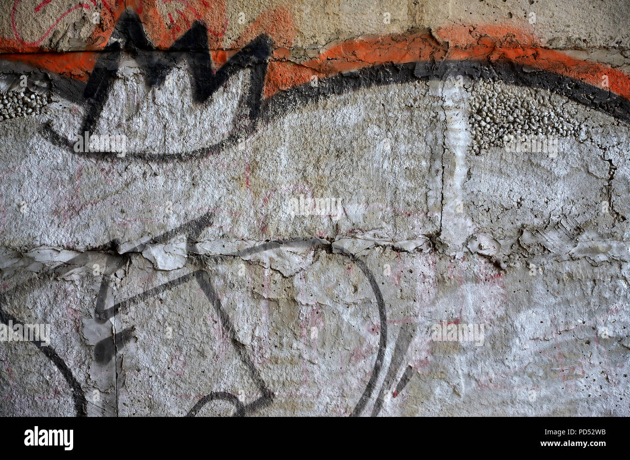 Detailed image of very old and aged color graffiti drawing on the wall. Background grunge street art picture Stock Photo