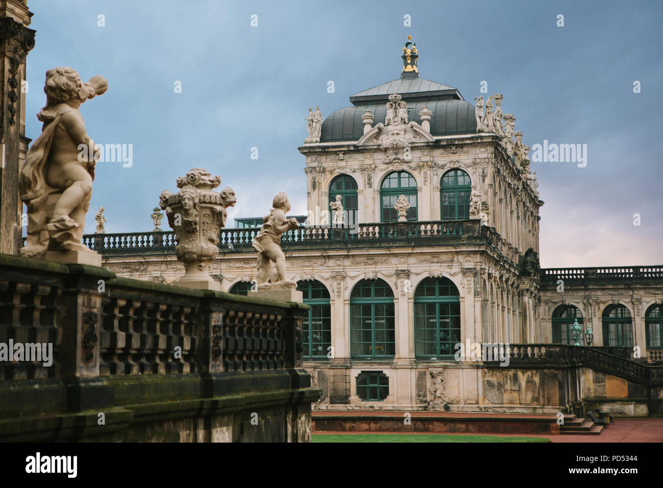 Zwinger in Dresden in Germany against the background of the setting sun in the evening. It was built in the 17th century. One of the sights of the city. Stock Photo