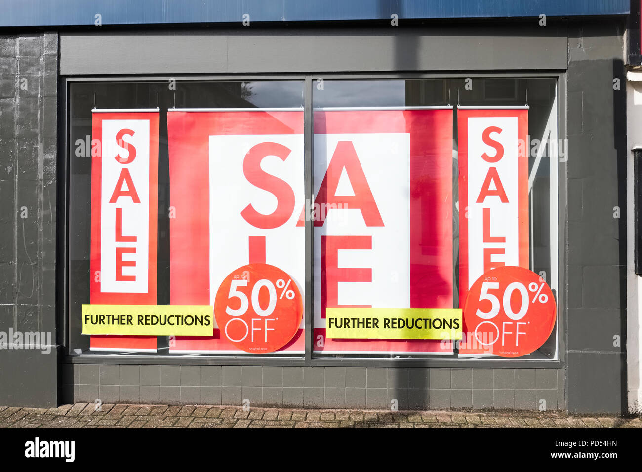 Shop Window Sale Sign Clothes Red White Banner Store Stock Photo - Alamy