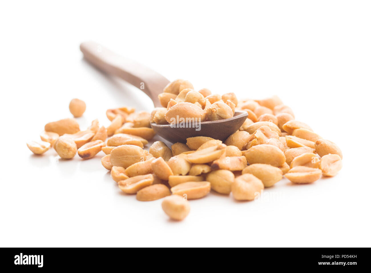 Salted roasted peanuts isolated on white background. Stock Photo