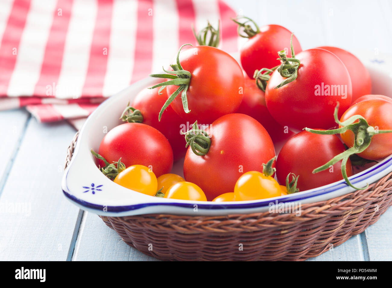 Tasty various tomatoes in bowl Stock Photo - Alamy