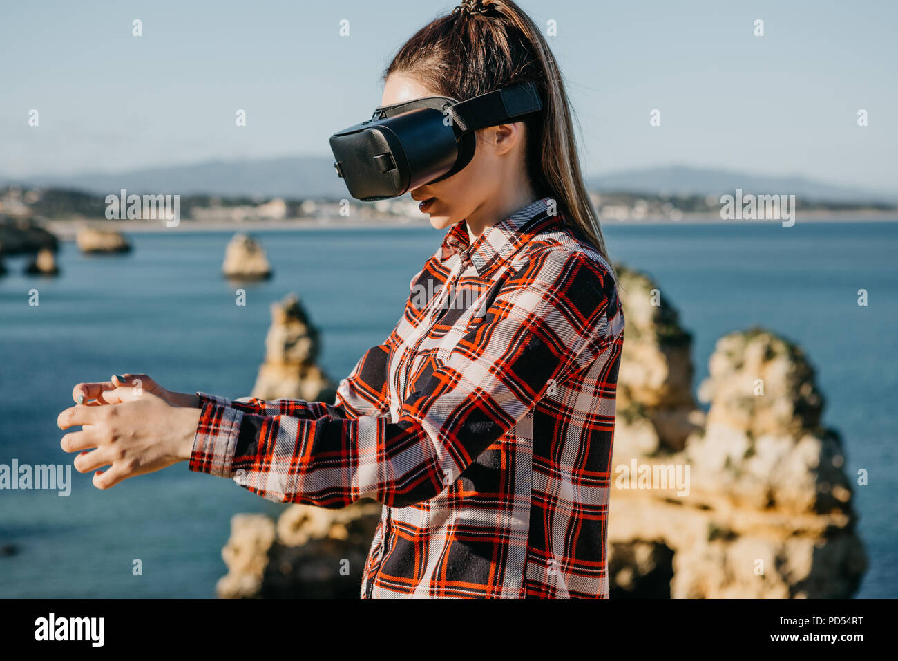 The girl in glasses of a virtual reality. Modern technology in everyday