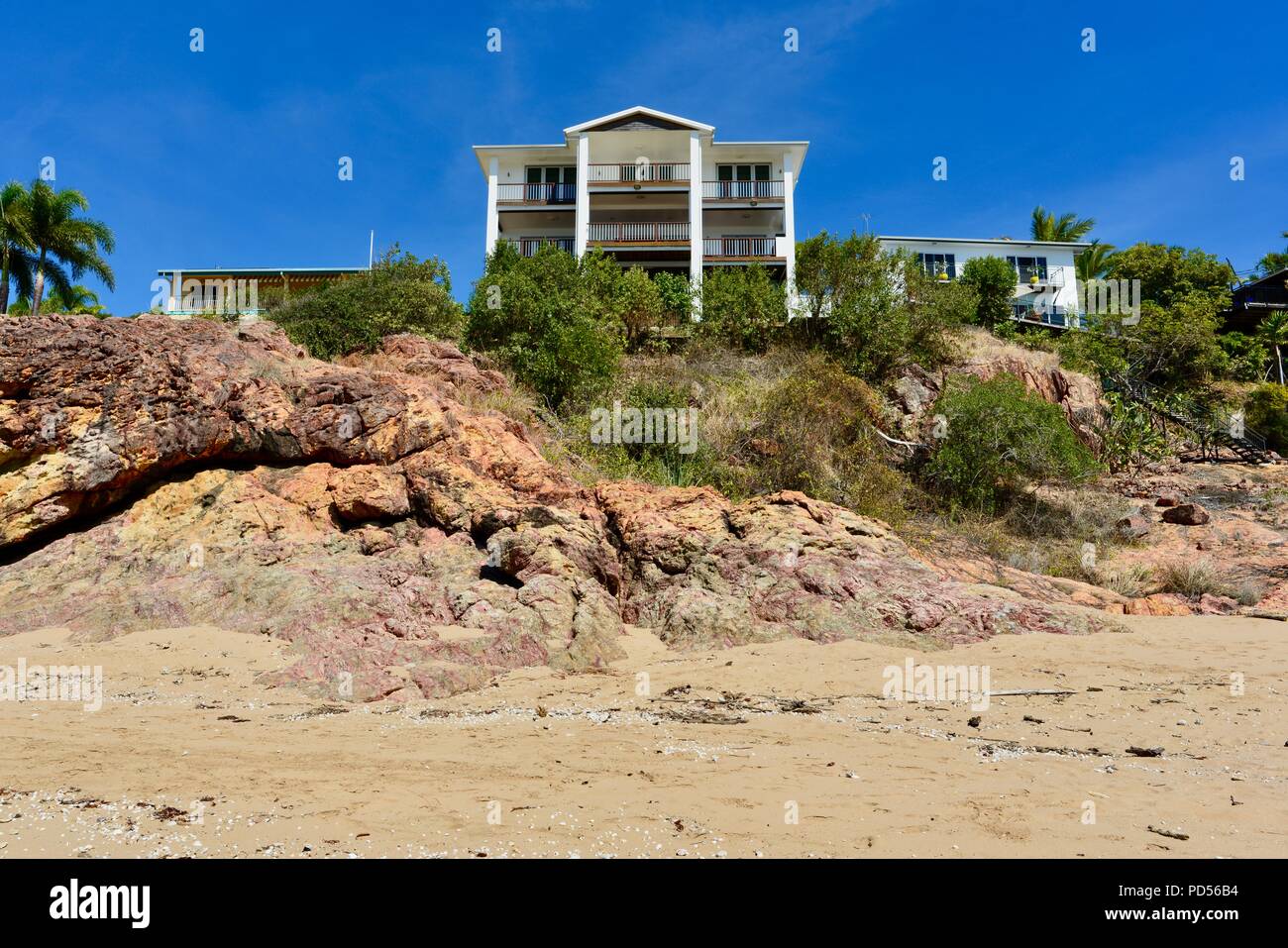 Large white house on a beach, coastal property, Toomulla QLD, Australia
