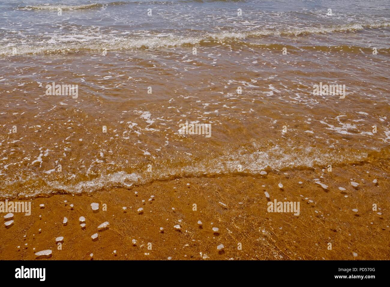 Water gently flowing over sand, Toomulla QLD, Australia Stock Photo