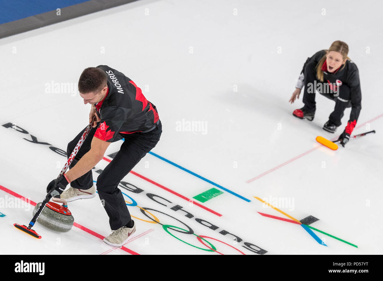 John Morris and Kaitlyn Lawes (CAN) competing in the Mixed Doubles Curling round robin at the Olympic Winter Games PyeongChang 2018 Stock Photo