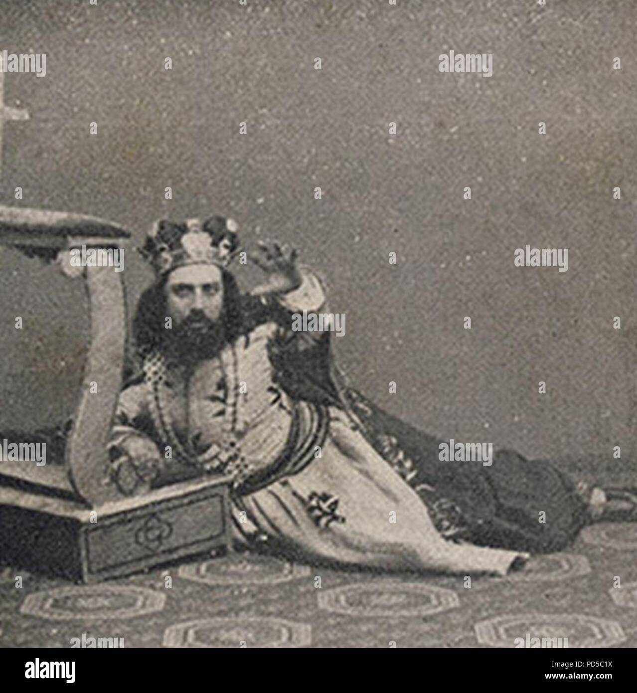 Amleto-Faccio-1871-Antonio Cotogni as the King. Stock Photo