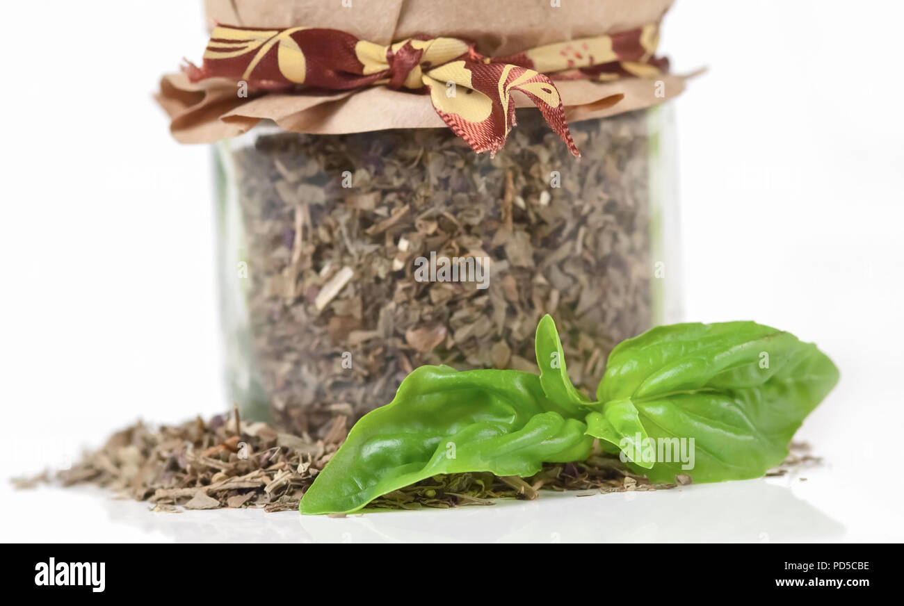 Fresh and dried basil on white background Stock Photo