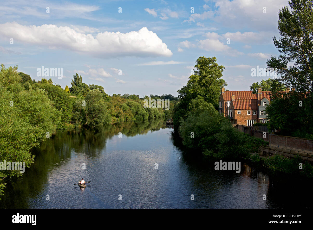 Man in inflatable kayak on River Tees, Yarm, North Yorkshire, England UK Stock Photo