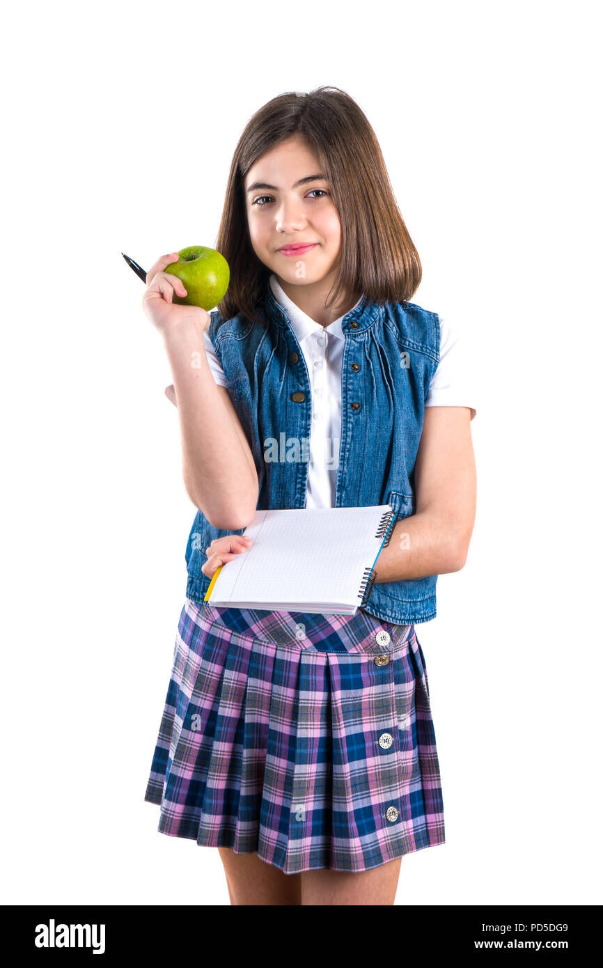 schoolgirl with notebook and apple on white background Stock Photo - Alamy