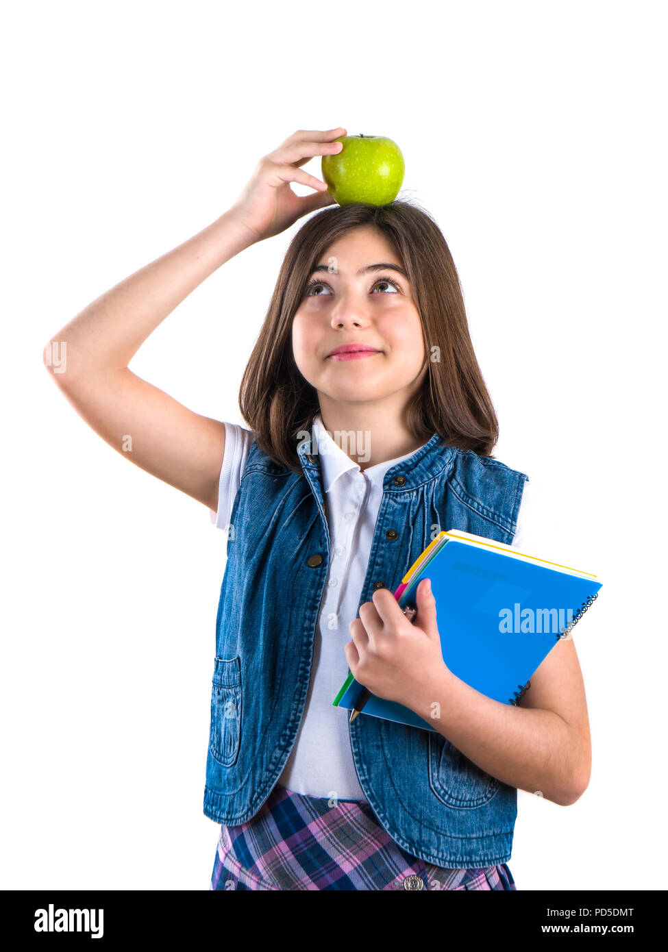 schoolgirl with notebook and apple on white background Stock Photo - Alamy