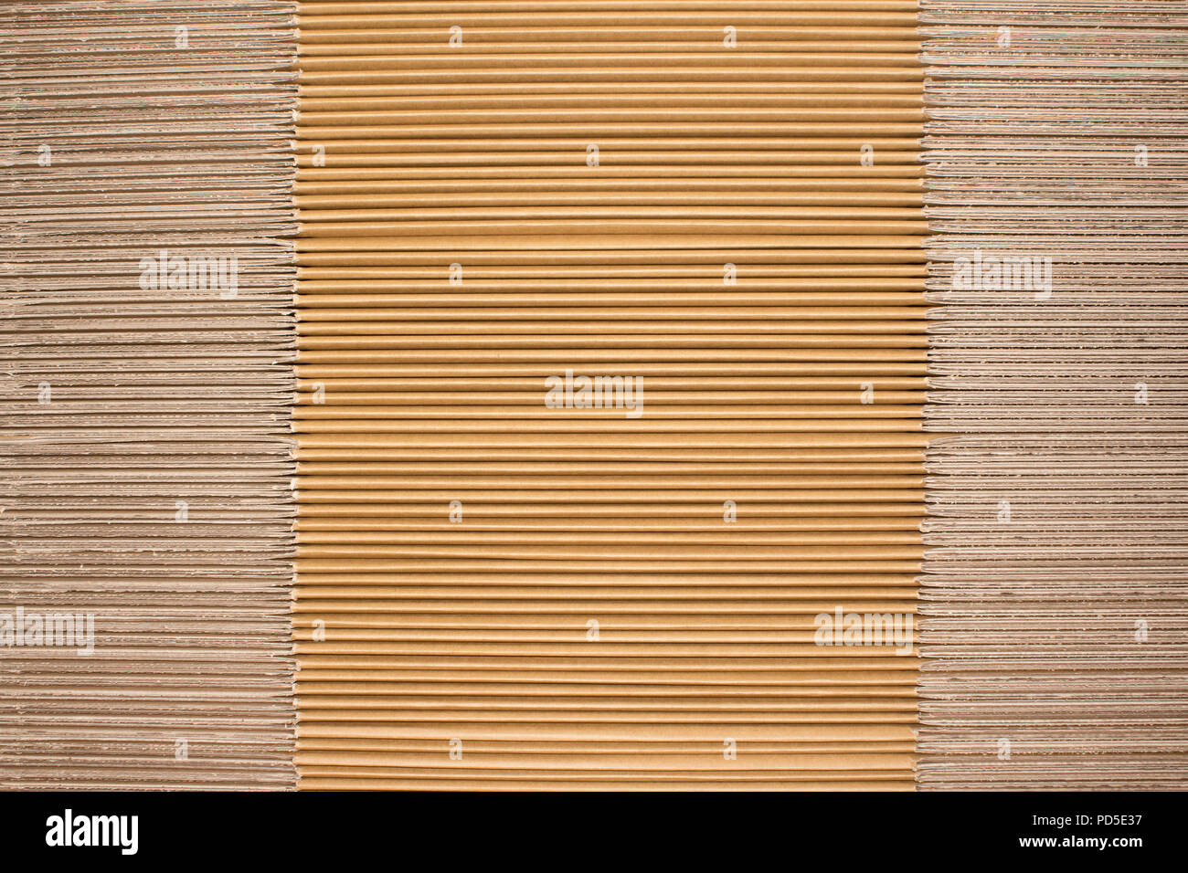 Stack of flat industrial folding cardboard packaging boxes Stock Photo