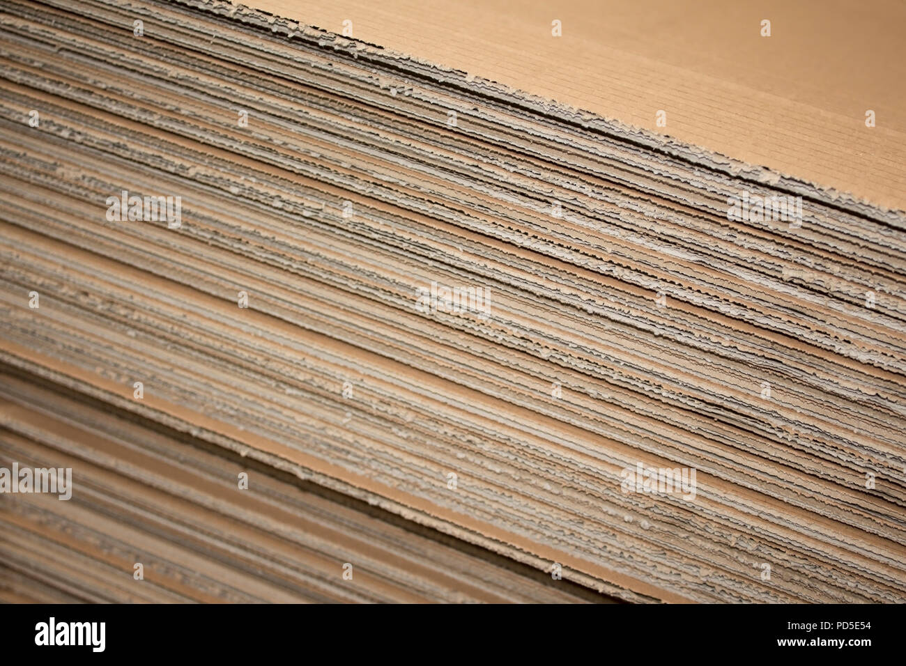 Stack of flat industrial folding cardboard packaging boxes Stock Photo