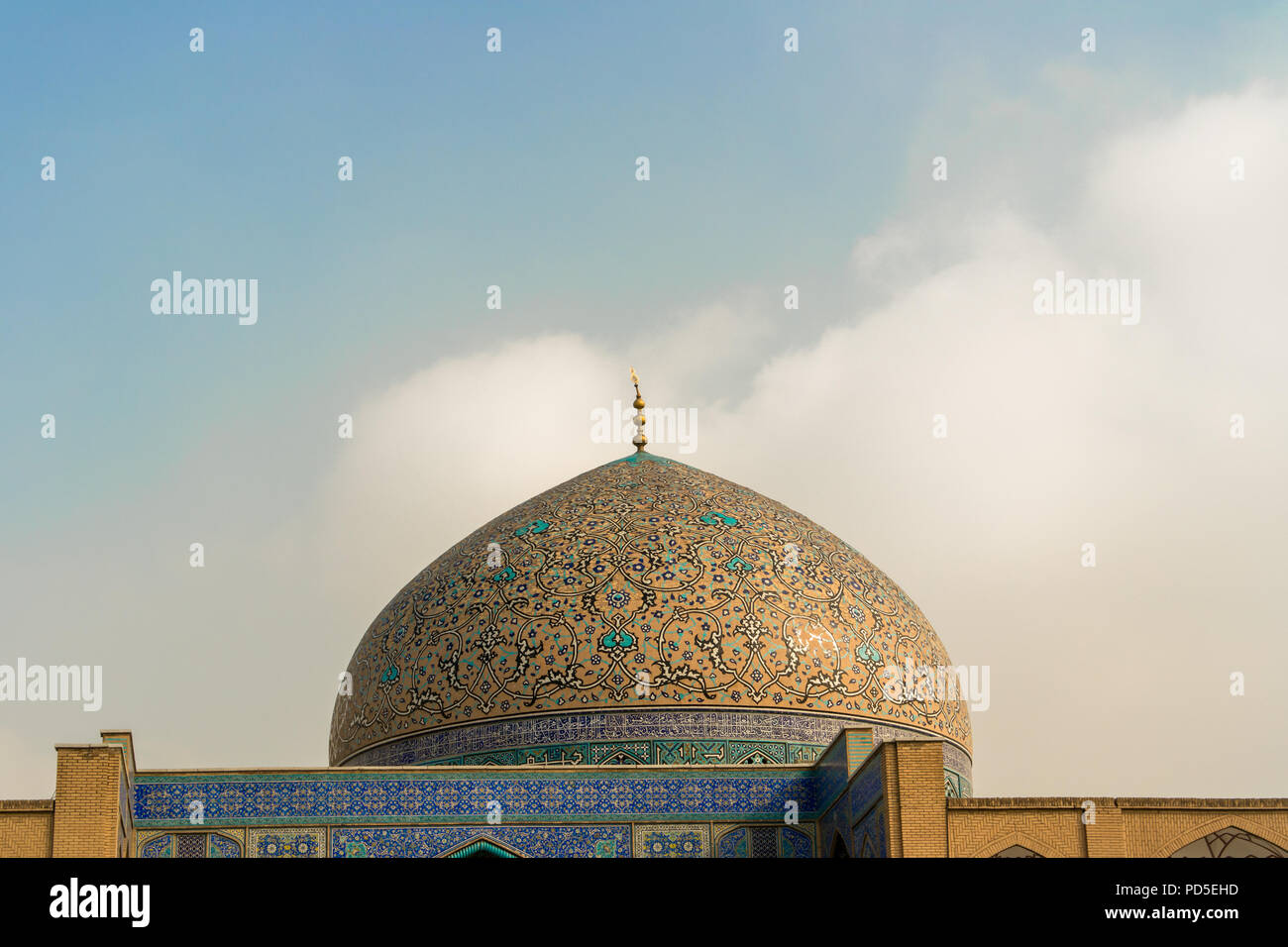 The impressive and colourful dome of the Sheikh Lotfollah Mosque in Naqsh-e-Jahan Square, Isfahan, Iran. Stock Photo