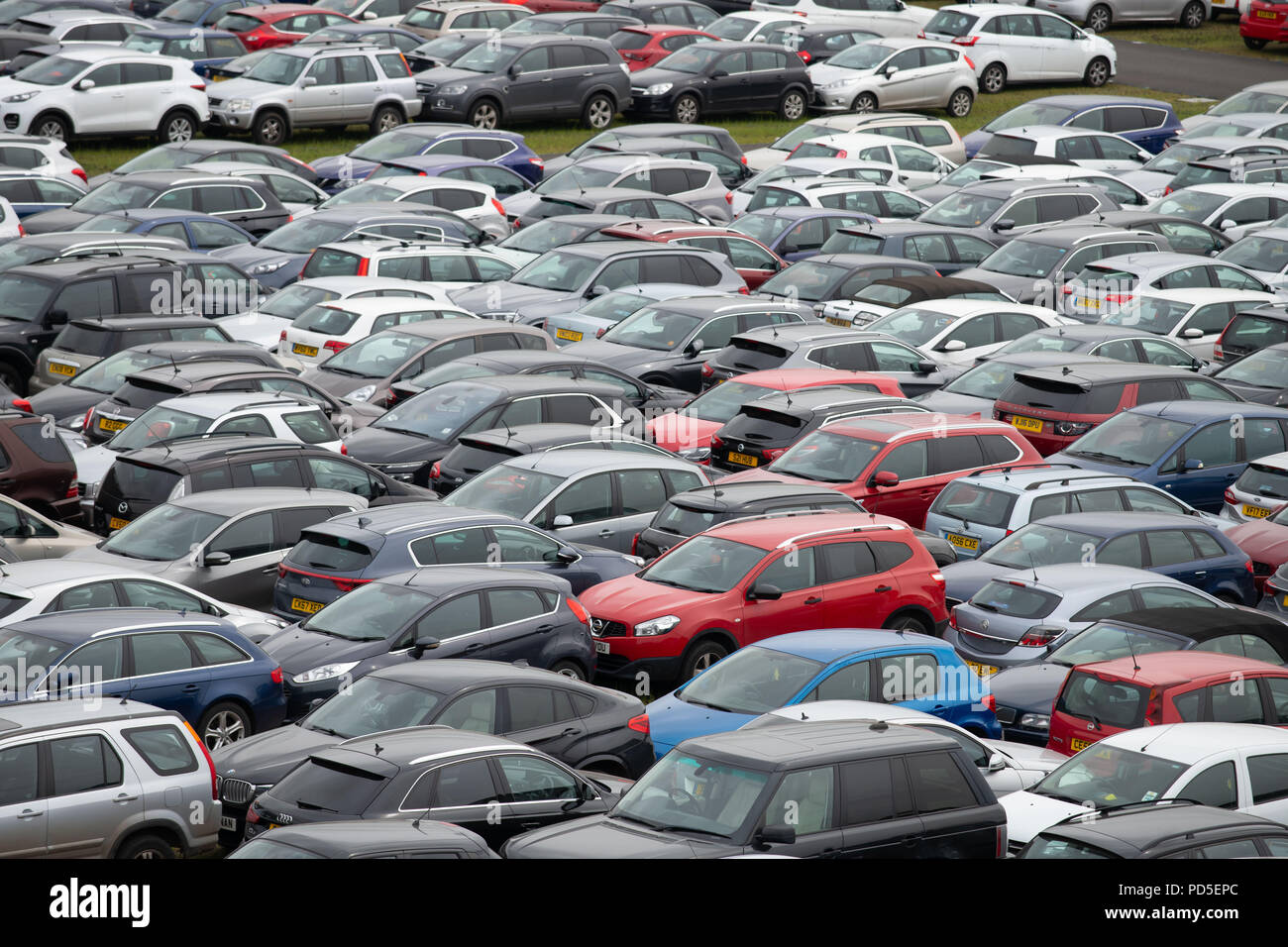 Cars parked in field car hires stock photography and images Alamy