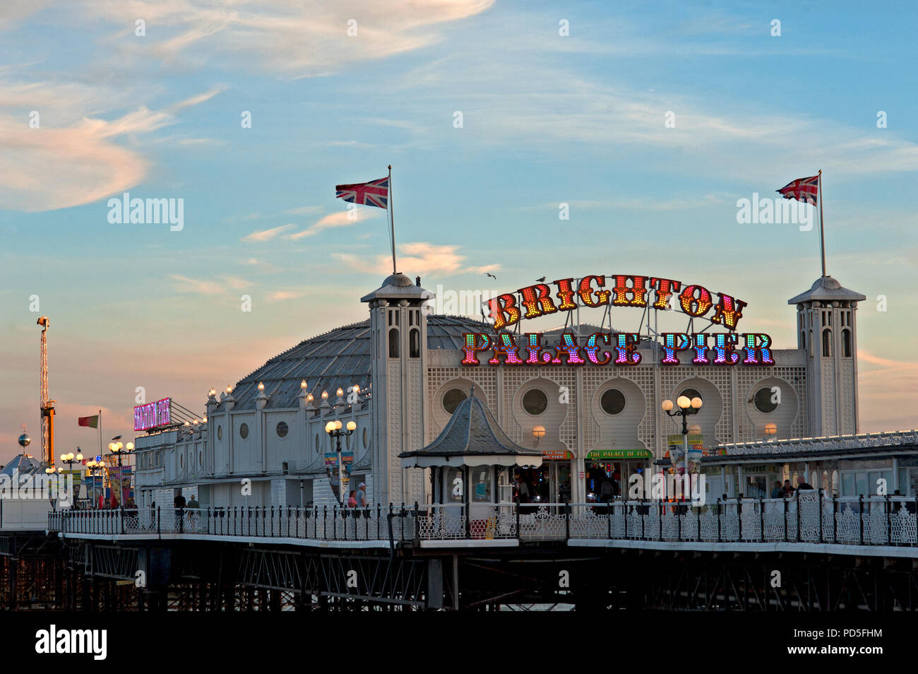The famous Brighton Palace Pier on England's south coast changed its name in 2018 to Brighton Palace Pier, a combination of its two previous names. Stock Photo