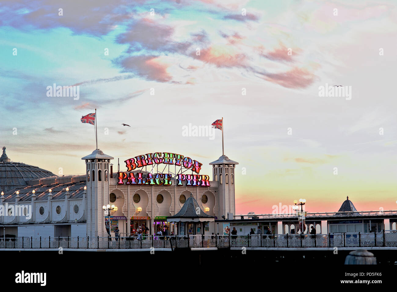 The famous Brighton Palace Pier on England's south coast changed its name in 2018 to Brighton Palace Pier, a combination of its two previous names. Stock Photo
