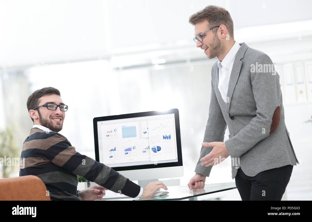 two businessmen analyzing stats financial data Stock Photo