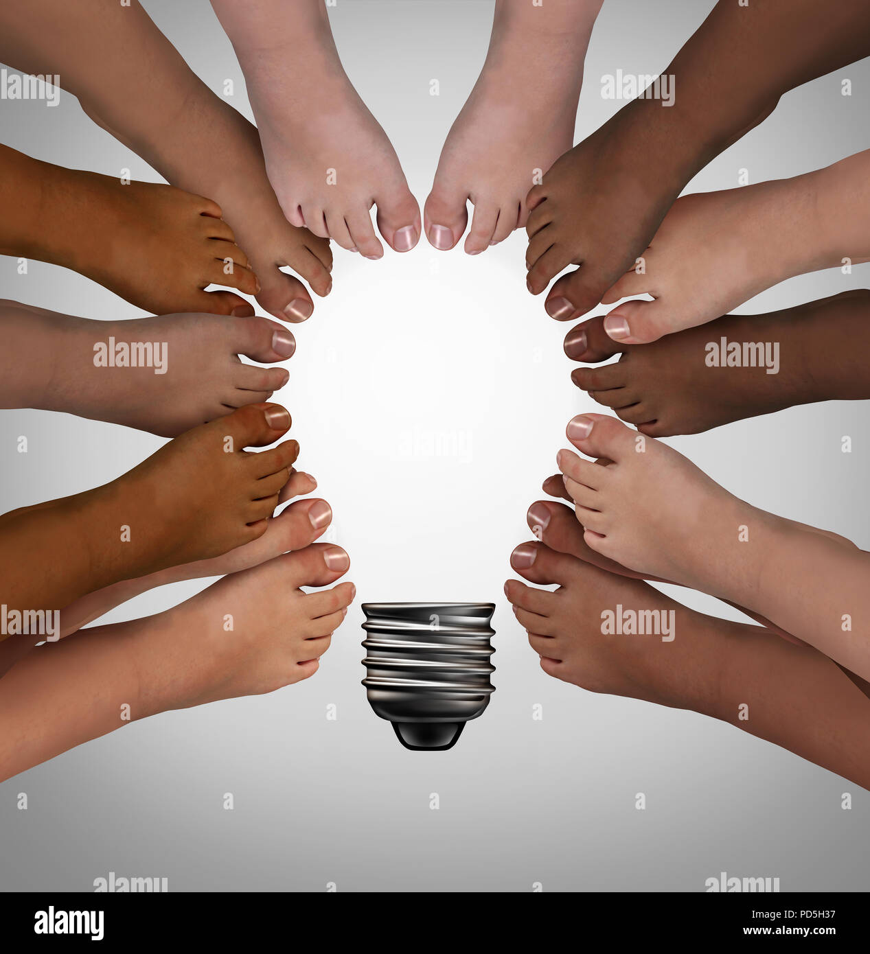 Diversity standing together as diverse people thinking as a team joining feet into the shape of an inspirational light bulb as a community support. Stock Photo