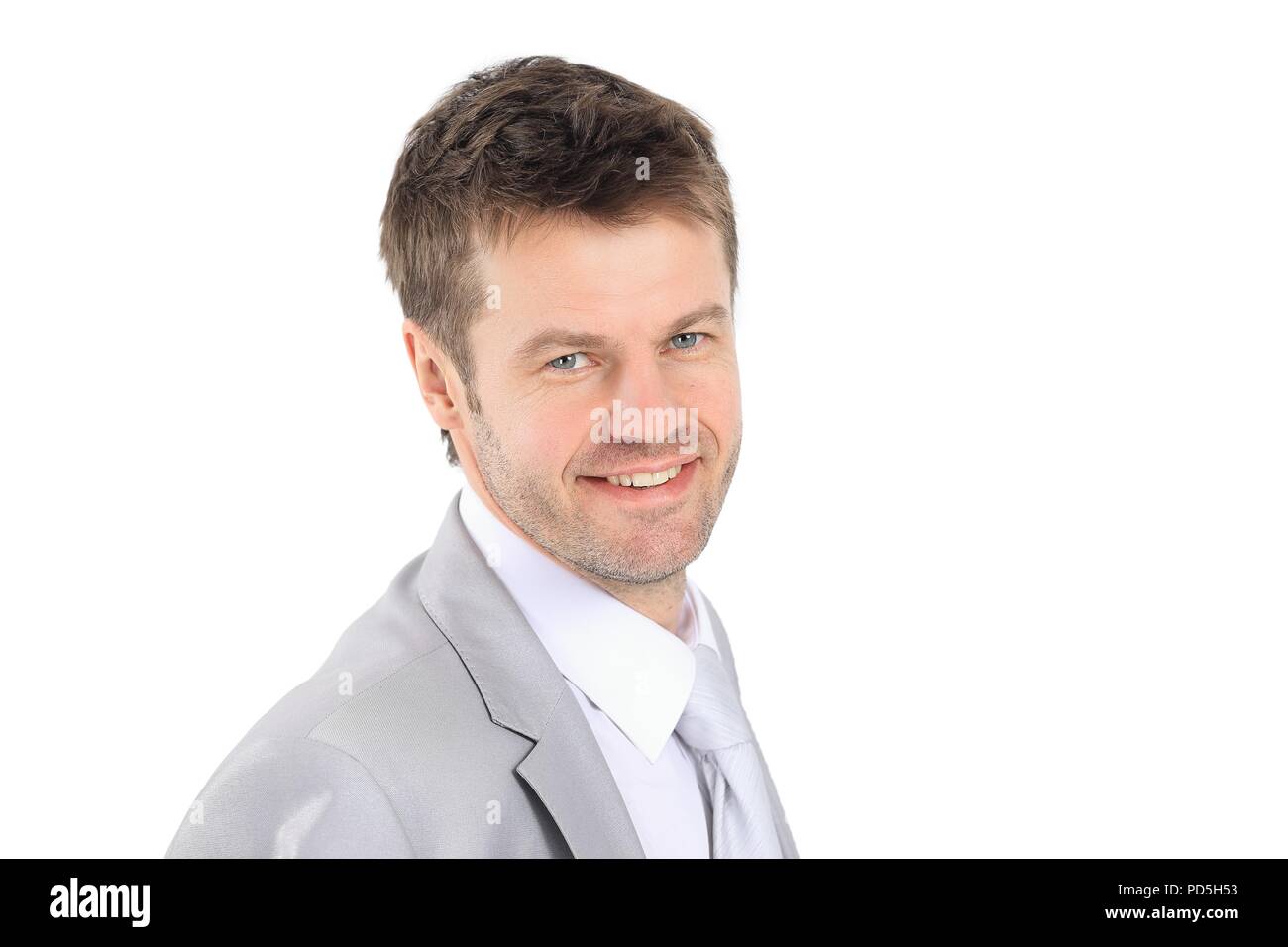 portrait of young businessman in a gray suit Stock Photo - Alamy