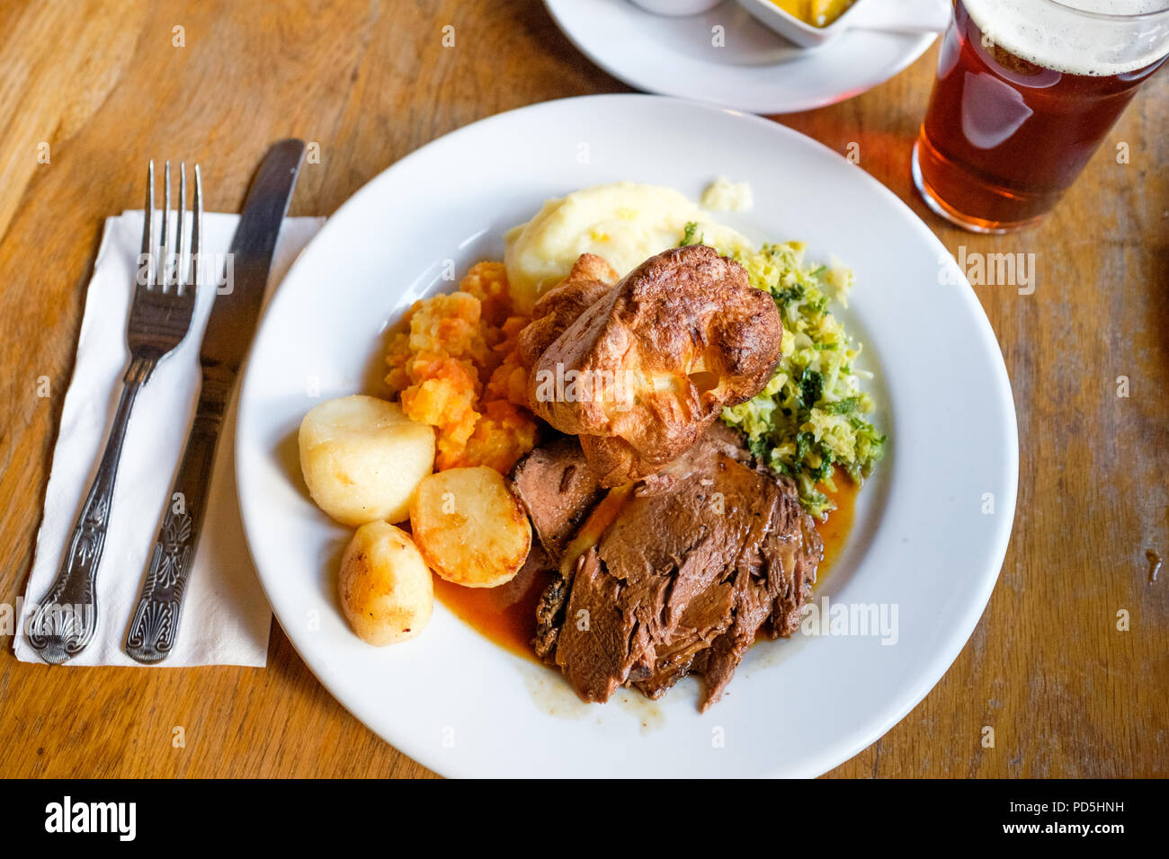 A plate of roast beef with vegetables for Sunday lunch at The Black Bull Inn in Frosterley, County Durham, England. Stock Photo