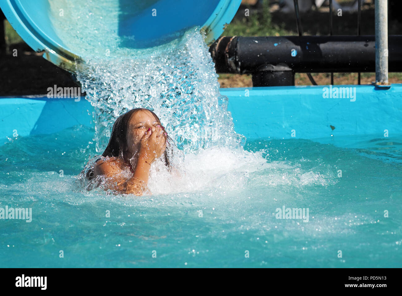 Playing at the water park hi-res stock photography and images - Alamy