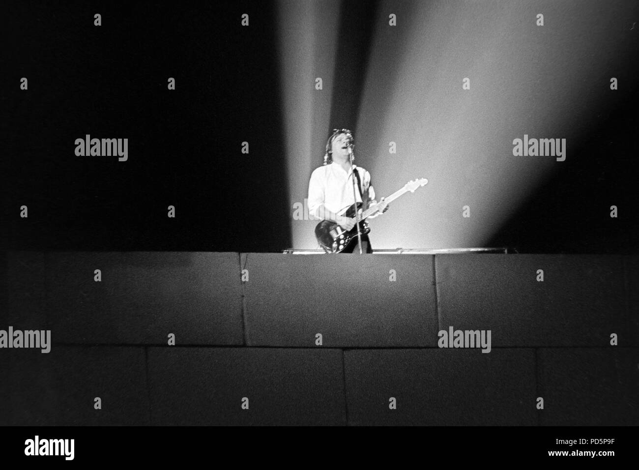 Dortmund, Germany, 20th. Feb.1981 - David Gilmour, guitarist and singer of british psychedelic rock band PINK FLOYD performing THE WALL concert at the Westfalenhalle in Dortmund/Germany (digital image from a b/w-film-negative) Stock Photo