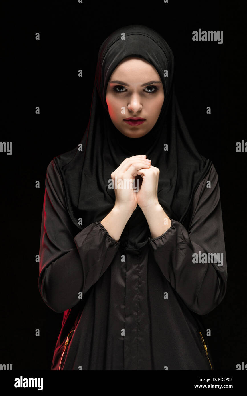 Portrait of young Muslim woman in traditional clothes Stock Photo - Alamy